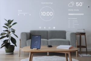 On the walls, an image of the time, weather, temperature, and humidity is shown, symbolizing the integrated automation of smart home upgrades. A digital tablet on a wooden table displaying a smart home controller paired with a smart thermostat.