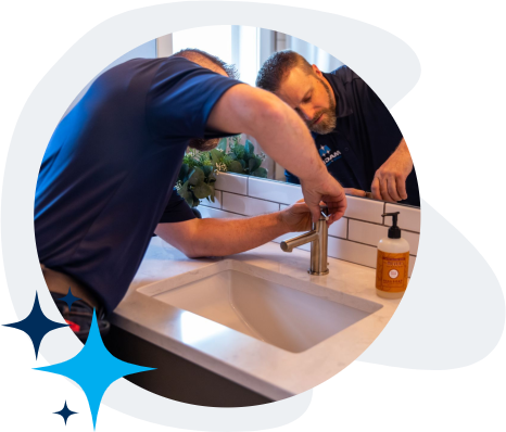 Technician Working on Faucet Image
